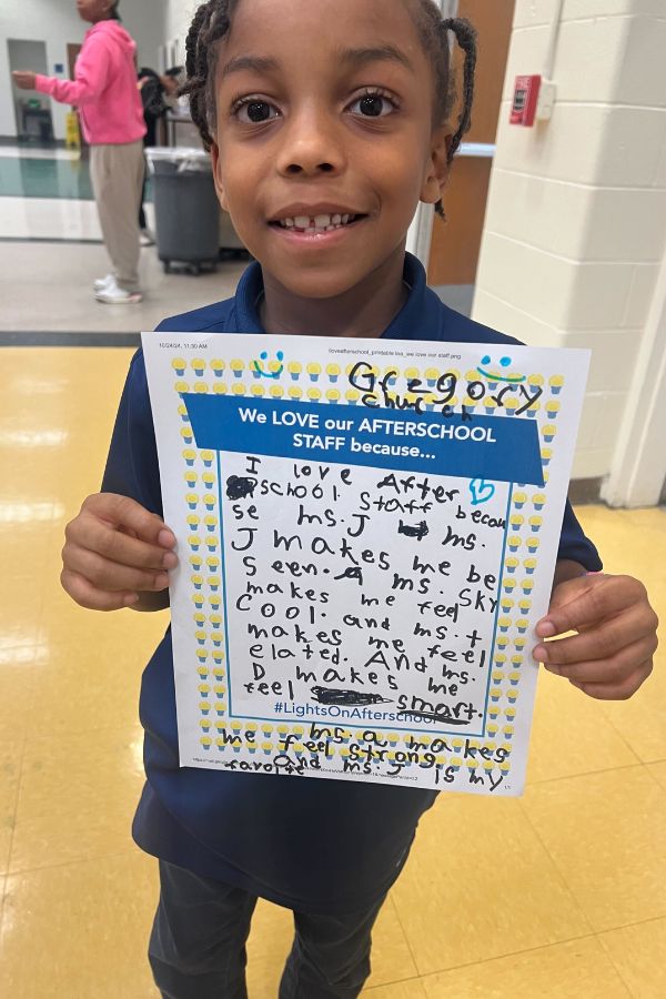 Students in the TLC Program shouting "I soar with WINGS. Let me tell you why."