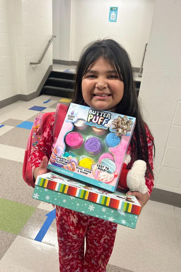 Students in the TLC Program shouting "I soar with WINGS. Let me tell you why."