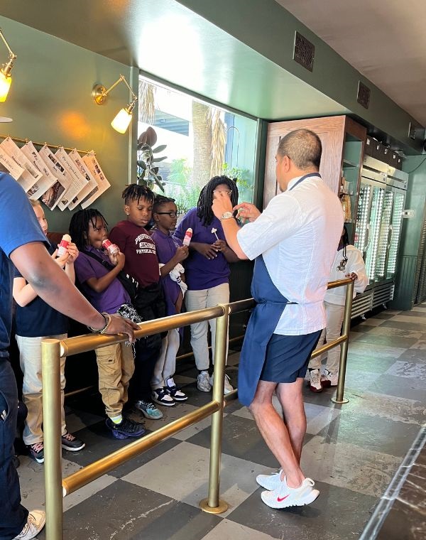 Chef taks to kids about restaurants