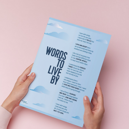 the words to live by on a sheet of paper